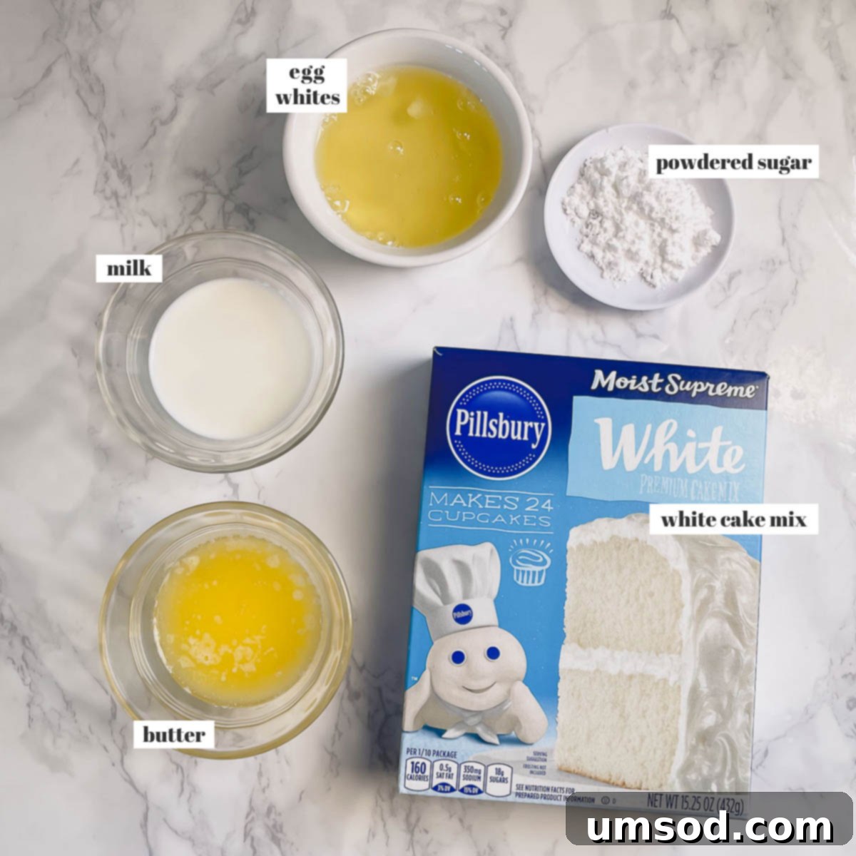 Enchanted White Swirl 3 Key ingredients laid out for making the Snow White Roll Cake.