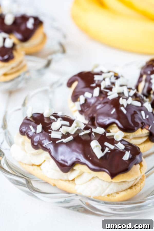 Banana Cream Pie Eclairs - delicate choux pastry filled with luscious banana cream filling and topped with rich chocolate ganache.