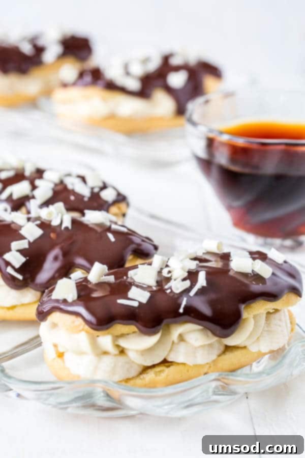 Finished Banana Cream Pie Eclairs arranged on a serving plate.