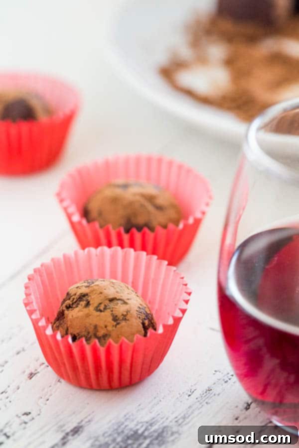 Sinfully Simple Spiked Truffles 4 A collection of homemade Red Wine Truffles, demonstrating their elegant simplicity and uniform spherical shape.