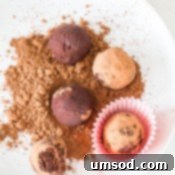 Sinfully Simple Spiked Truffles 7 A perfectly rolled Red Wine Truffle coated in cocoa, ready to be devoured.