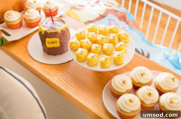 Winnie the Pooh shaped macarons and vanilla cupcakes