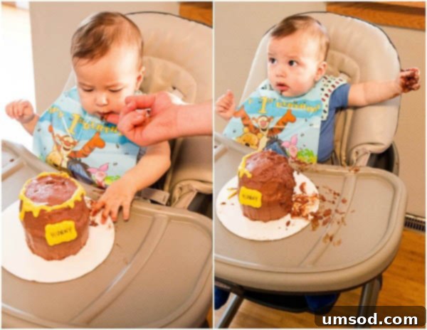 Grant joyfully eating his first birthday smash cake