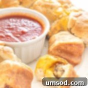Individual portions of meatball monkey bread on a serving dish.
