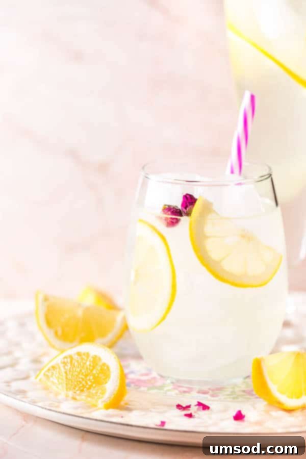 Refreshingly floral, this rose lemonade is so easy to make and perfect pitcher drink for all your outdoor activities this summer, garnished with fresh roses.