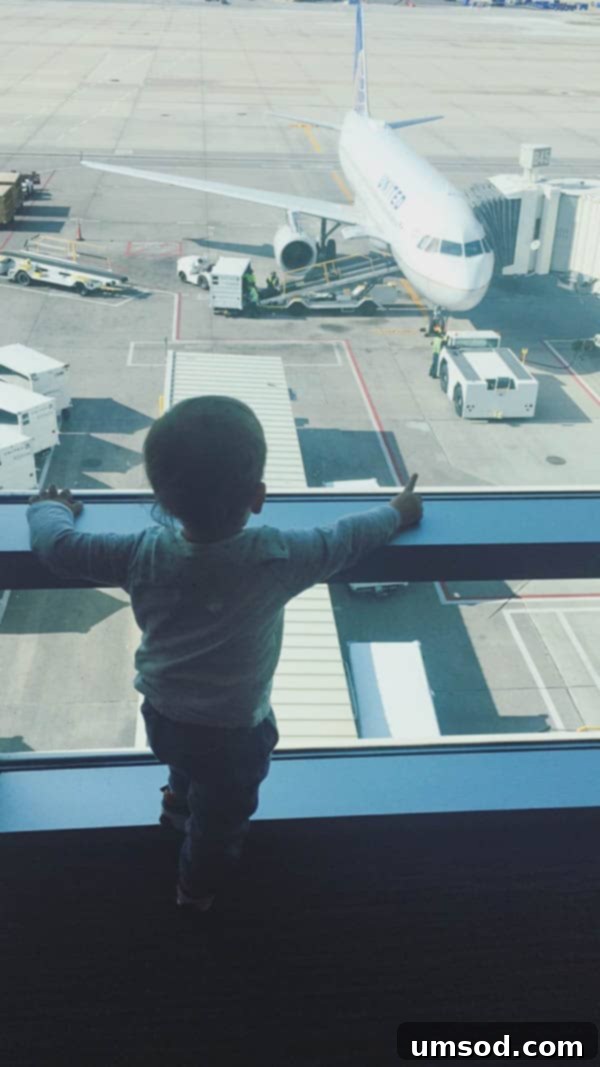 Our little one, Grant, sleeping peacefully on his first international flight to Mongolia.