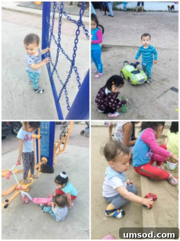 Grant having a blast at a local Erdenet playground, playing with cars and round objects.