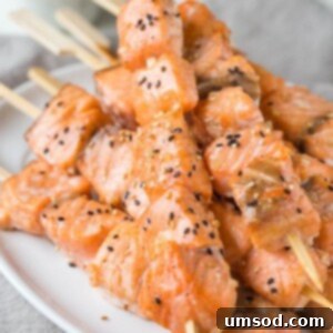 Sticky Honey Sesame Salmon Skewers 5 A delicious plate of Honey Sesame Salmon Kebabs.