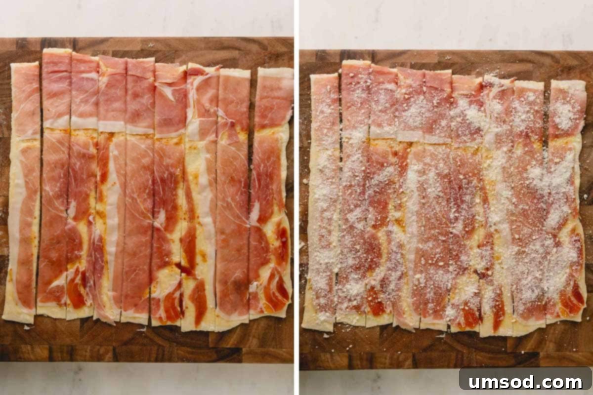 Raw puff pastry strips layered with apricot jam, prosciutto, and parmesan cheese, ready for twisting.