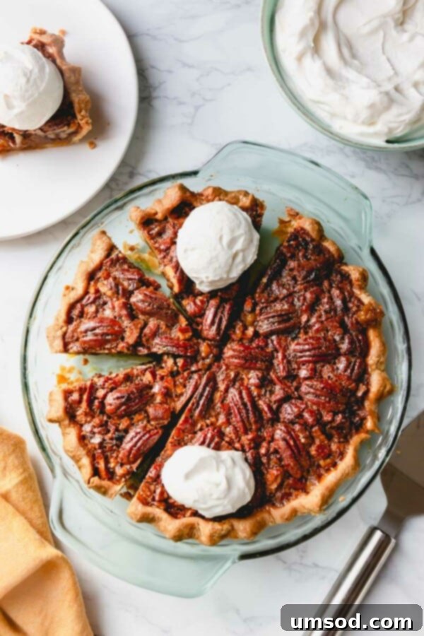 Slice of Pecan Pie showing rich filling and nuts