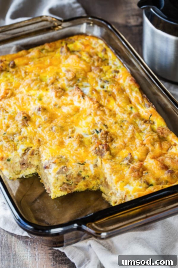 Stuffing Revival Breakfast Bake 3 A rectangular baking dish filled with golden-brown Leftover Sausage Stuffing Breakfast Casserole, perfectly baked.