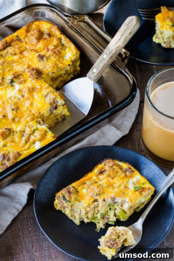 Stuffing Revival Breakfast Bake 6 A whole baking dish of leftover stuffing breakfast casserole alongside a single slice on a white plate, ready to be eaten.