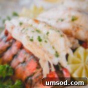 a baked lobster tail on its shell