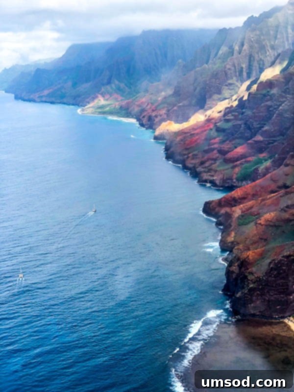 Toddler Friendly Kauai Exploring the Garden Isle 13 Panoramic view of a vibrant green Kauai landscape with winding rivers