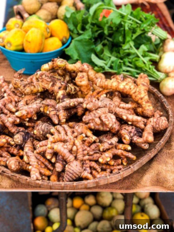 Toddler Friendly Kauai Exploring the Garden Isle 45 Vendor cutting open a fresh coconut at Kauai market