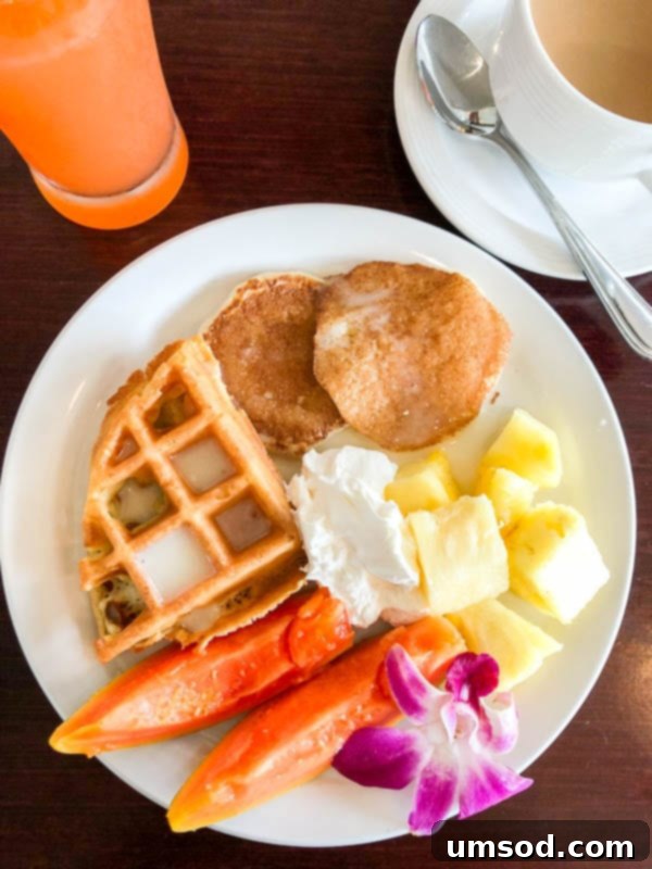 Toddler Friendly Kauai Exploring the Garden Isle 55 Plate of fresh tropical fruits from a resort breakfast buffet