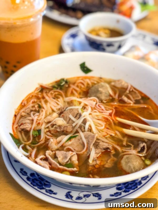 Appetizing bowl of Pho with fresh ingredients at Pho Kauai