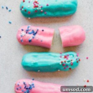 Pink or Blue Eclair Mystery 6 Delicious Gender Reveal Eclairs topped with blue and pink frosting and sprinkles, perfect for a celebration.