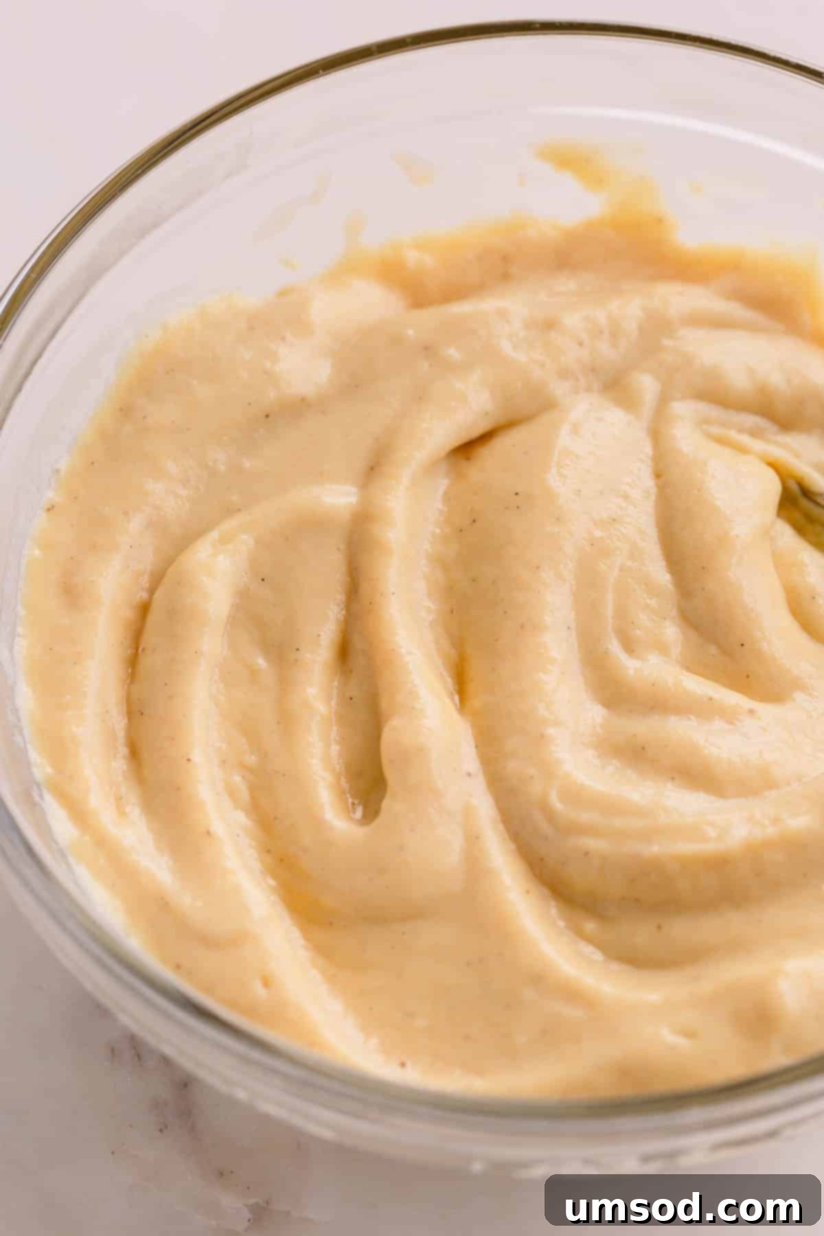 Homemade vanilla pudding in a bowl.