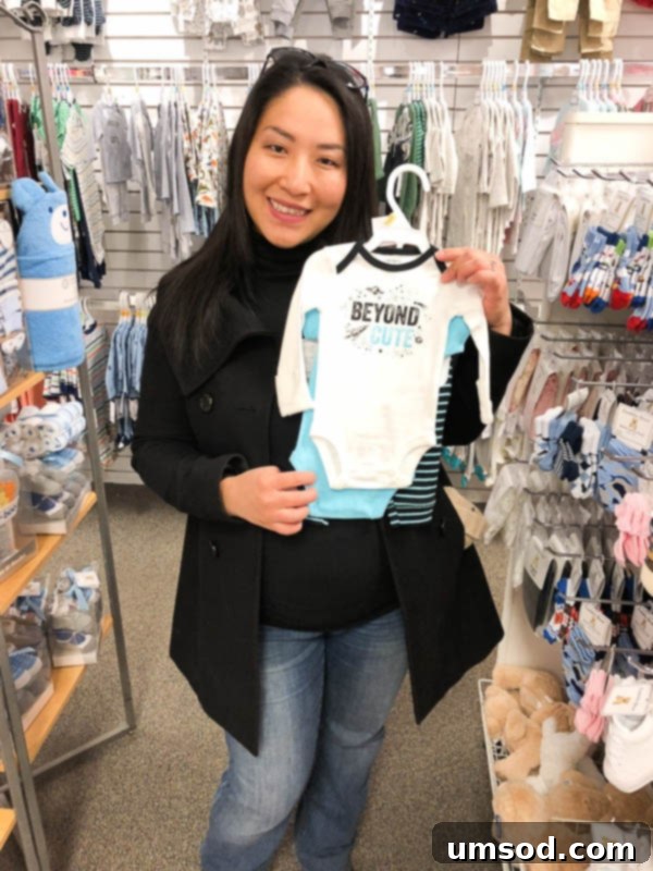 Adorable baby boy onesie set, symbolizing the gender reveal excitement.