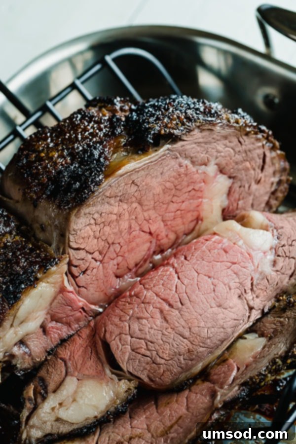 Ultimate Prime Rib Perfection 5 The fully cooked boneless prime rib roast, beautifully seared with a golden crust, resting in a roasting pan.