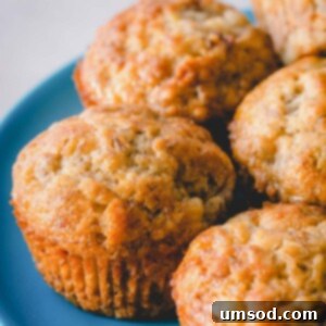 Effortless Banana Treats 12 Banana muffins on a blue plate.