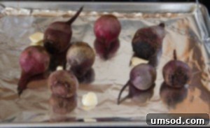 Step-by-step image of grating roasted beets into a bowl.