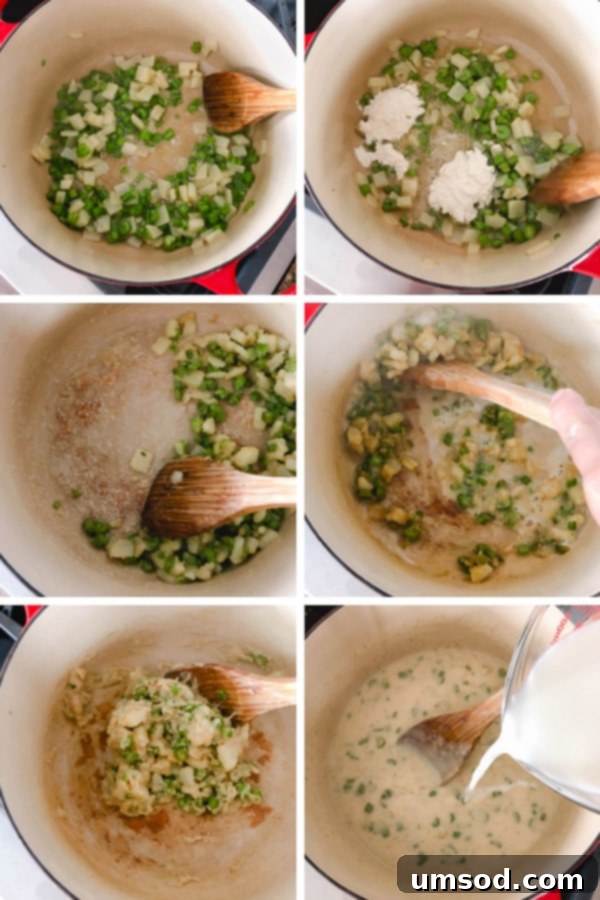 Hearty Oyster Potato Stew 4 A close-up of a spoon scooping a portion of rich and creamy oyster stew from a bowl, showcasing its delicious texture and the delicate oysters. Ready in just 30 minutes, it's a simple yet satisfying meal.