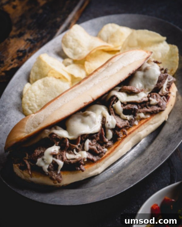 Super quick and easy Philly cheesesteak recipe with indulgent provolone cheese sauce for a special weeknight dinner.