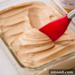 Close-up of fluffy salted caramel buttercream frosting, a true favorite for any dessert.