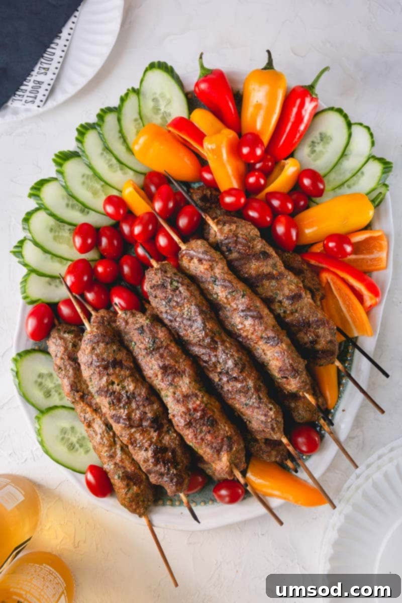 Urfa Kebab Excellence 2 Delicious and juicy Urfa kebabs on skewers, ready for grilling, showcasing the mild and flavorful Turkish cuisine