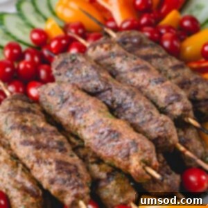 Urfa Kebab Excellence 8 Juicy and flavorful Urfa kebabs on a skewer, cooked to perfection, ideal for a family meal or barbecue