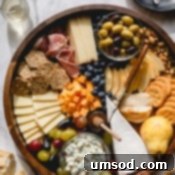 Crafting the Ultimate Charcuterie and Cheese Board 10 Close up view of the charcuterie board, showcasing delicious details