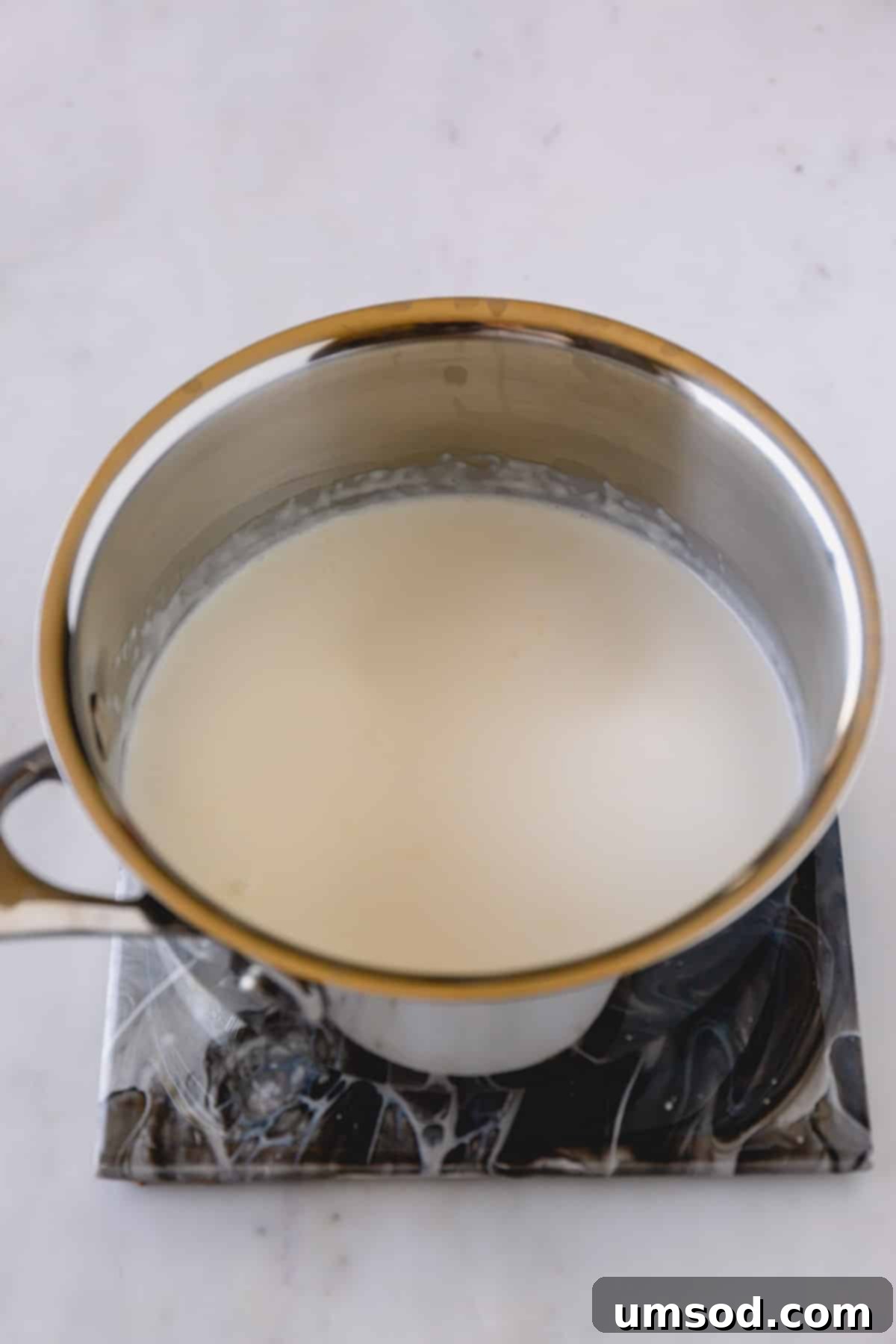 Cream in a small saucepan.