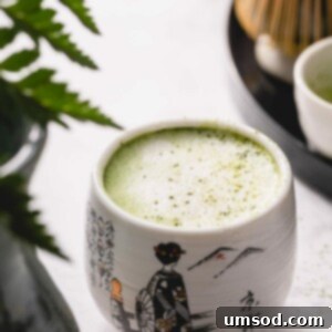 Mastering the Matcha Latte 14 A vibrant green matcha latte in a small cup, inviting warmth and comfort.