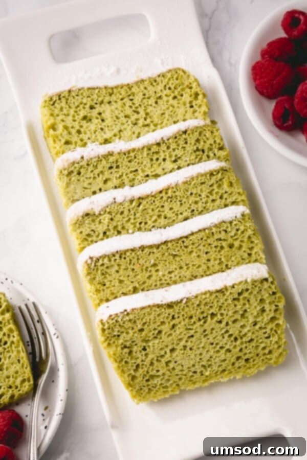 Close-up of a slice of matcha sponge cake, showing its soft and airy texture.