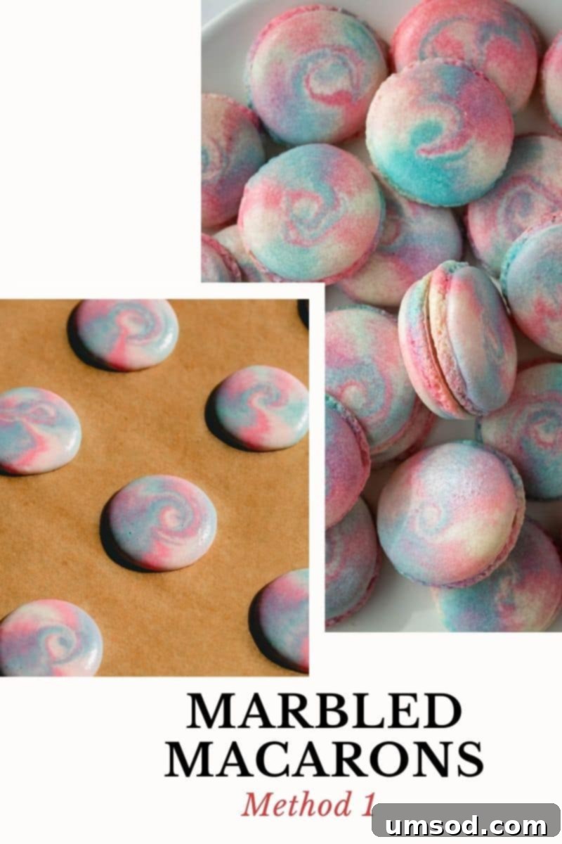 A selection of exquisitely marbled macaron shells, each showcasing unique and vibrant color swirls.