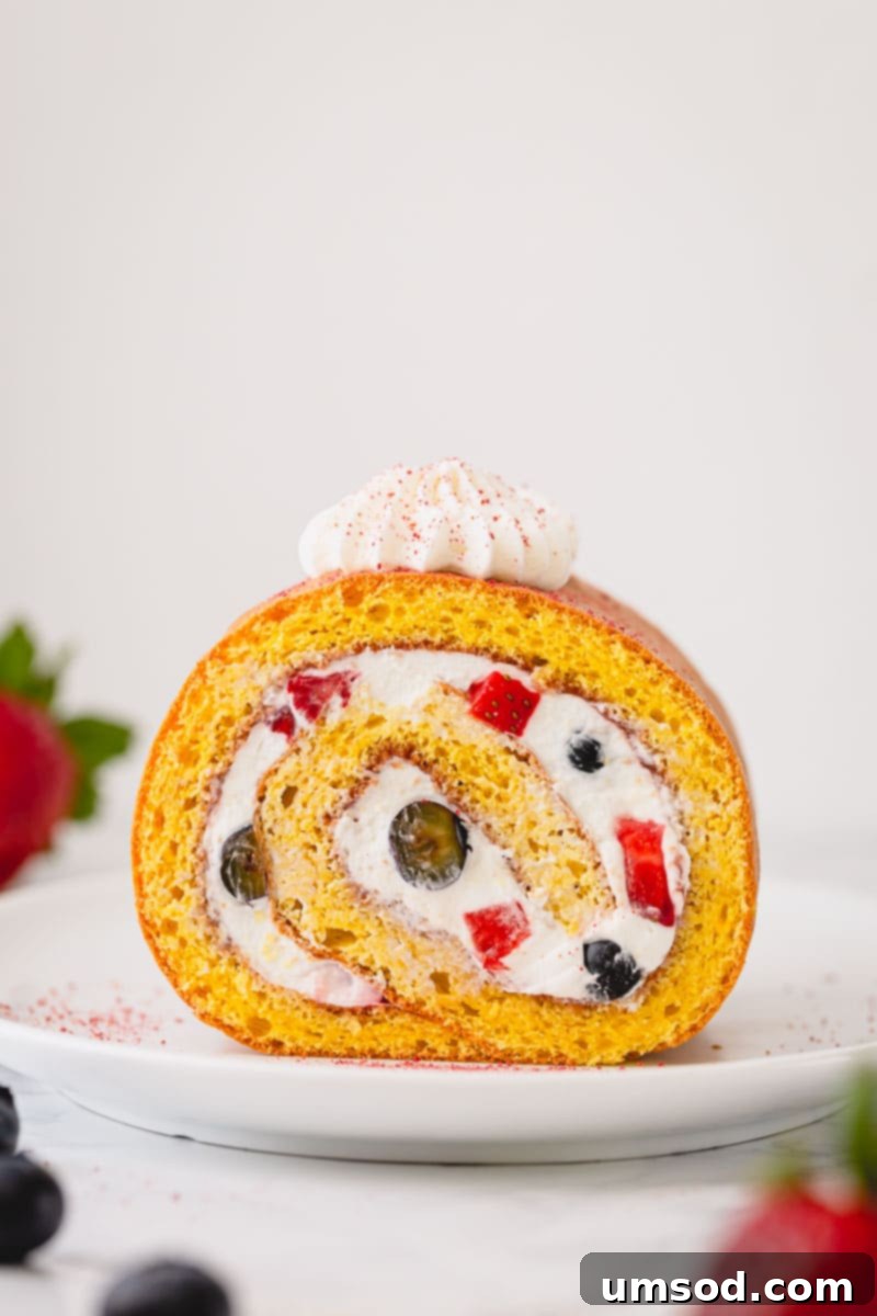 A perfectly executed roll cake, demonstrating the no-need-to-roll-hot method, resulting in an exceptionally springy, pliable, and crack-free sponge – a true baking success story.