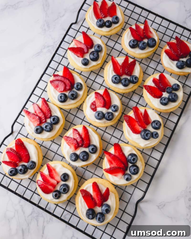 Another enticing view of mini fruit pizzas, showcasing their vibrant colors and appealing bite-sized form, perfect for sharing.