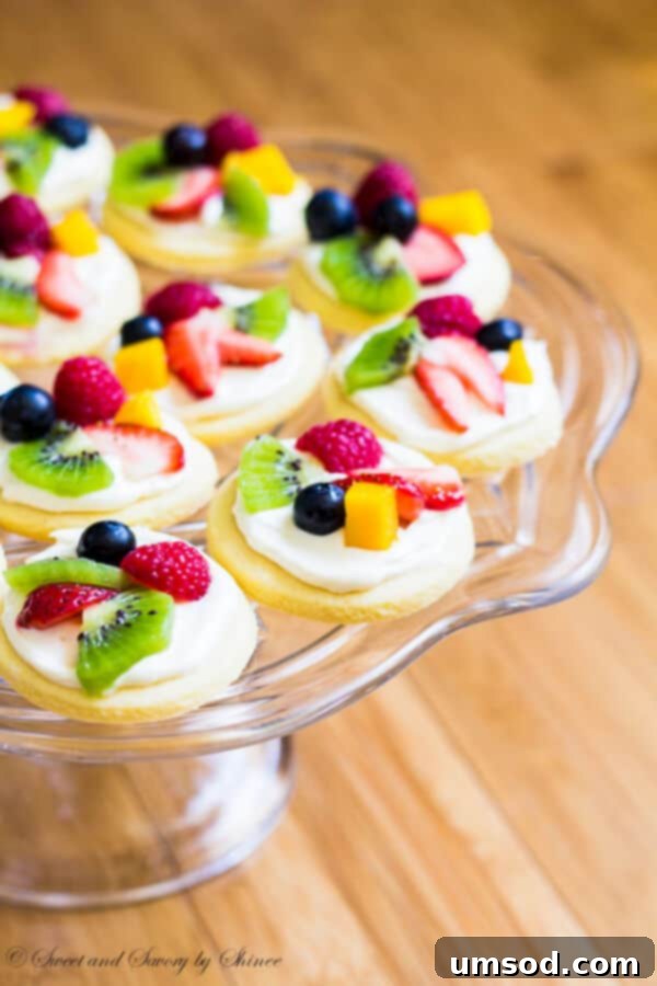Another beautiful shot of mini fruit pizzas from 2014, highlighting their fresh ingredients and perfect size for a summer treat.