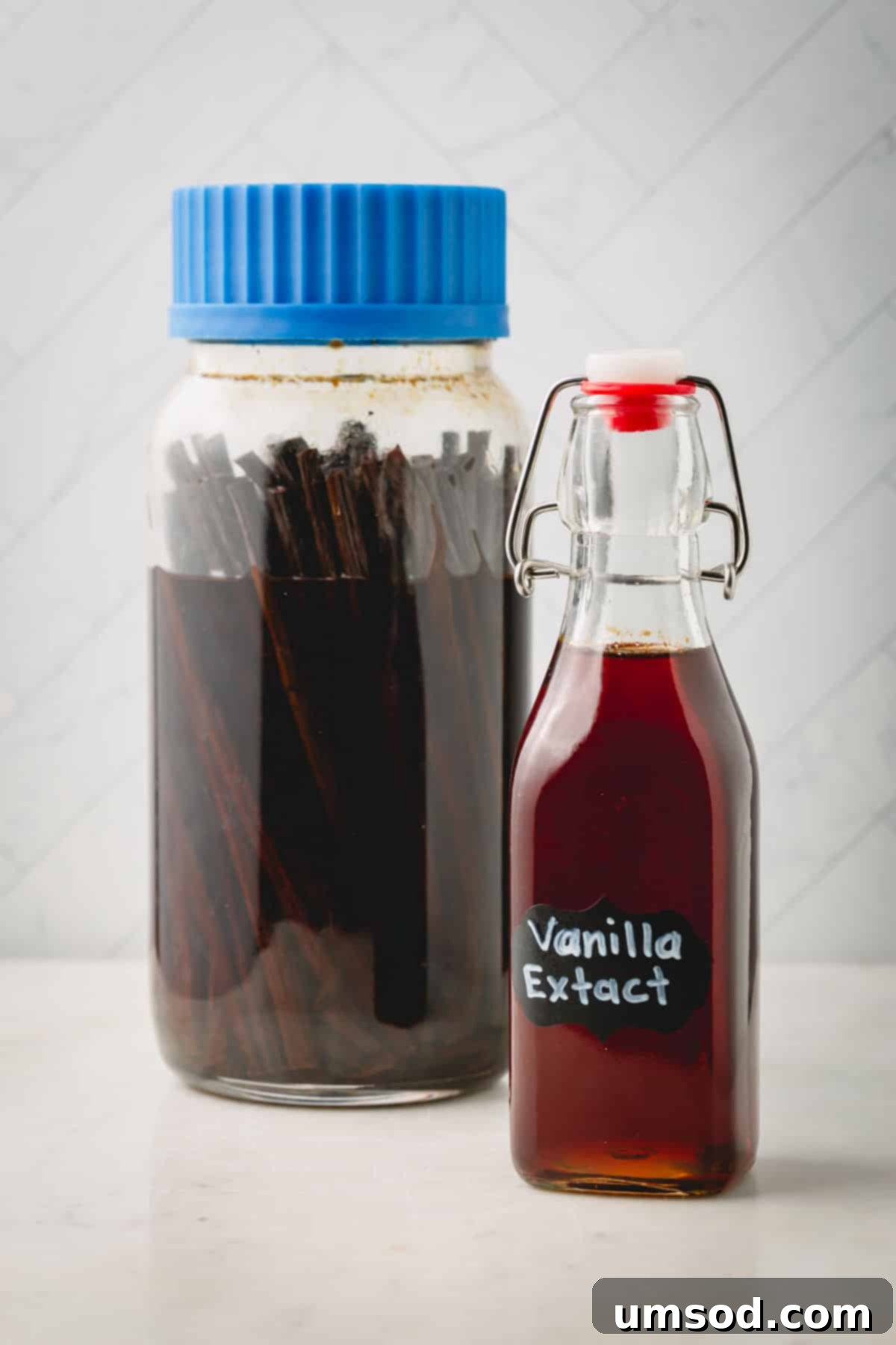 Crafting Your Own Vanilla Extract 3 Large jar of homemade vanilla extract steeping with vanilla beans, alongside a smaller bottle ready for use.