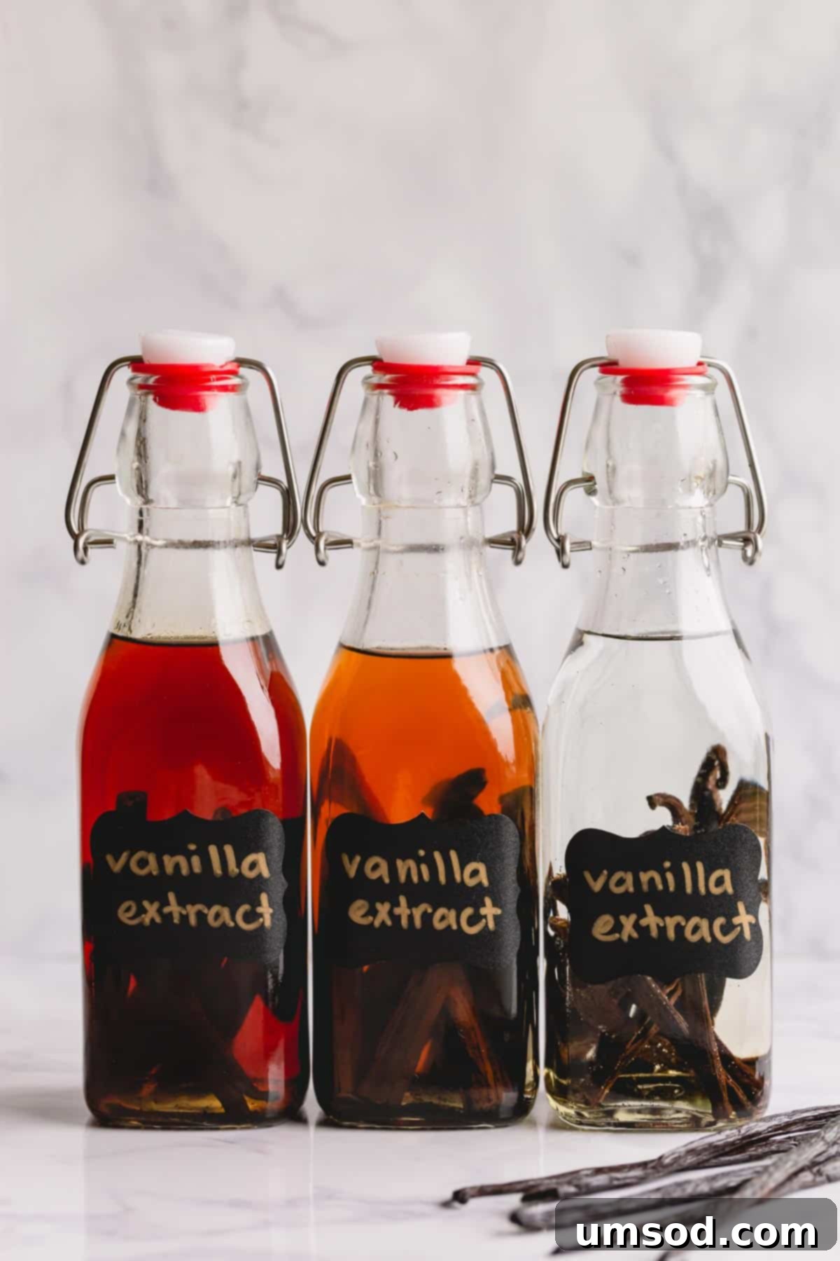 Crafting Your Own Vanilla Extract 9 Three bottles of homemade vanilla bean extracts, ready for storage.