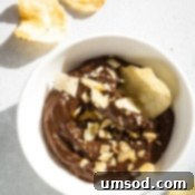 Avocado Chocolate Mousse in a bowl with spoon