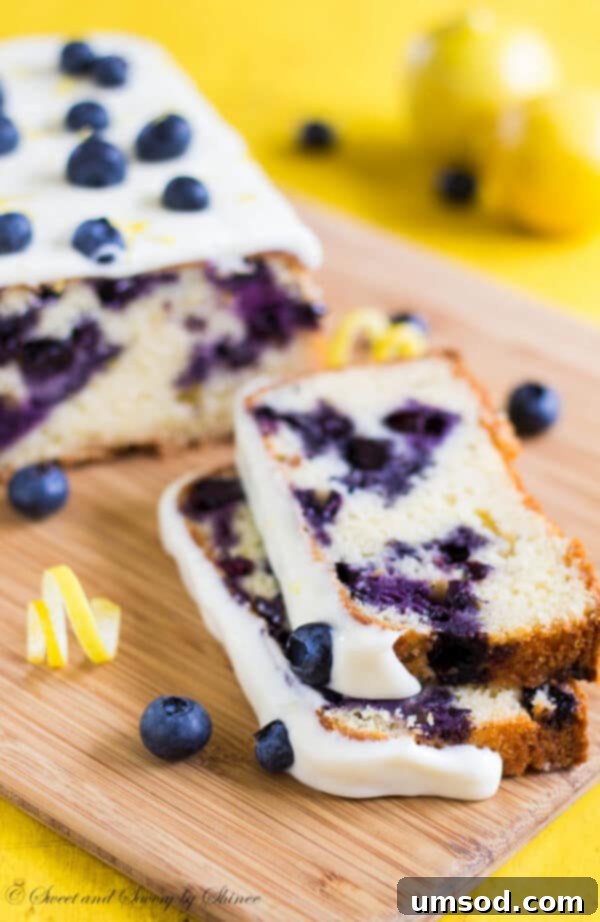 Zesty Lemon Blueberry Bake 6 A visually appealing step-by-step photograph illustrating the preparation of the blueberry lemon cake batter, highlighting its creamy texture and the vibrant blueberries being gently incorporated.