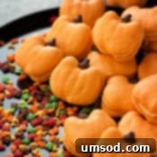 Harvest Pumpkin Macarons 7 A finished pumpkin macaron with a rich buttercream filling.