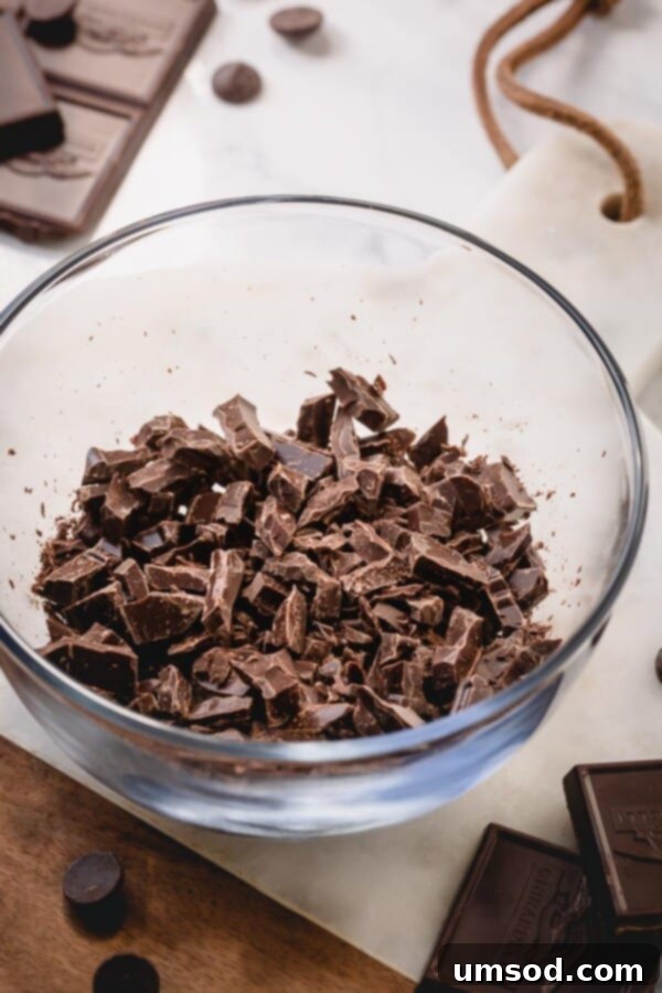 A close-up of chopped chocolate, ready for ganache making.
