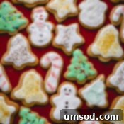 frosted christmas cookies on counter.