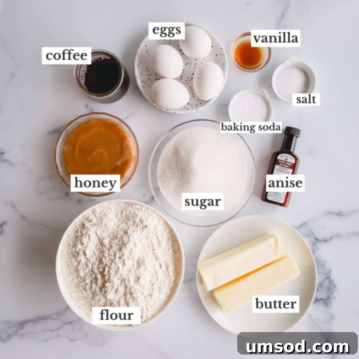 A beautifully arranged selection of essential ingredients for baking homemade honey cookies, including golden honey, coffee, and aromatic spices.