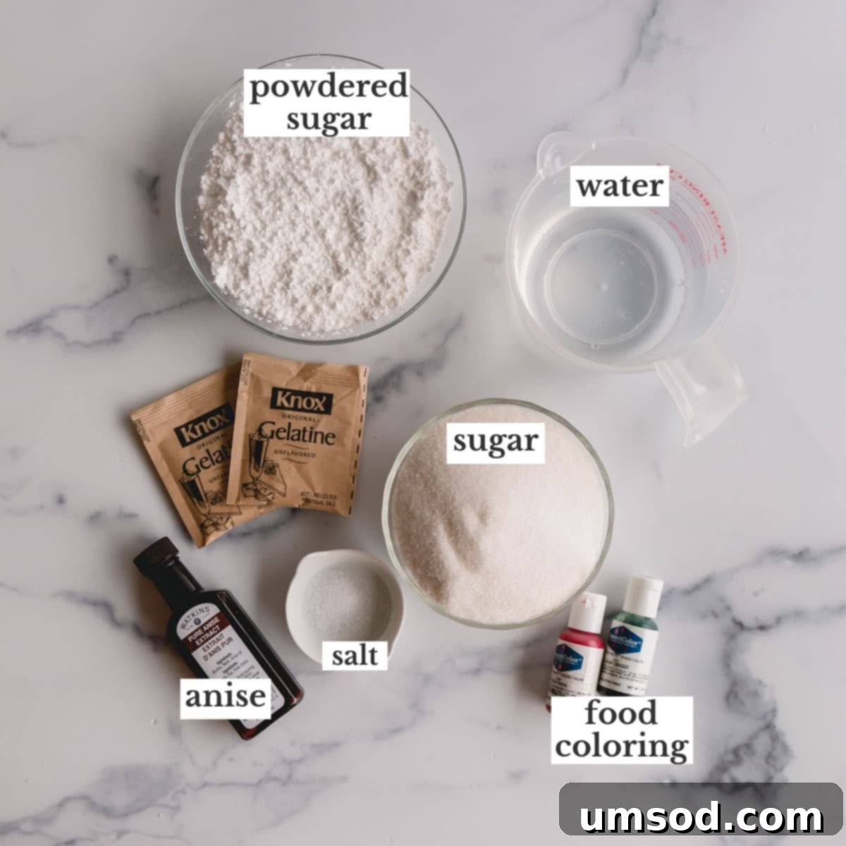 A carefully arranged set of ingredients required for making the smooth and shiny boiled cookie frosting.