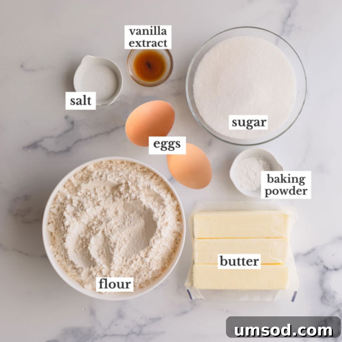 Tek Hamurdan 6dan Fazla Lezzet: Efsanevi Tereyağlı Kurabiye Hamuru 3 Individual ingredients for butter cookie dough, neatly arranged on a counter before mixing.